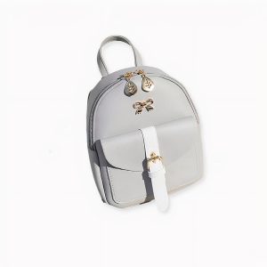 Mini mochila de polipiel con joyas doradas