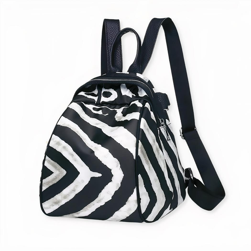 Mochila pequeña de mujer en tejido con estampado de cebra